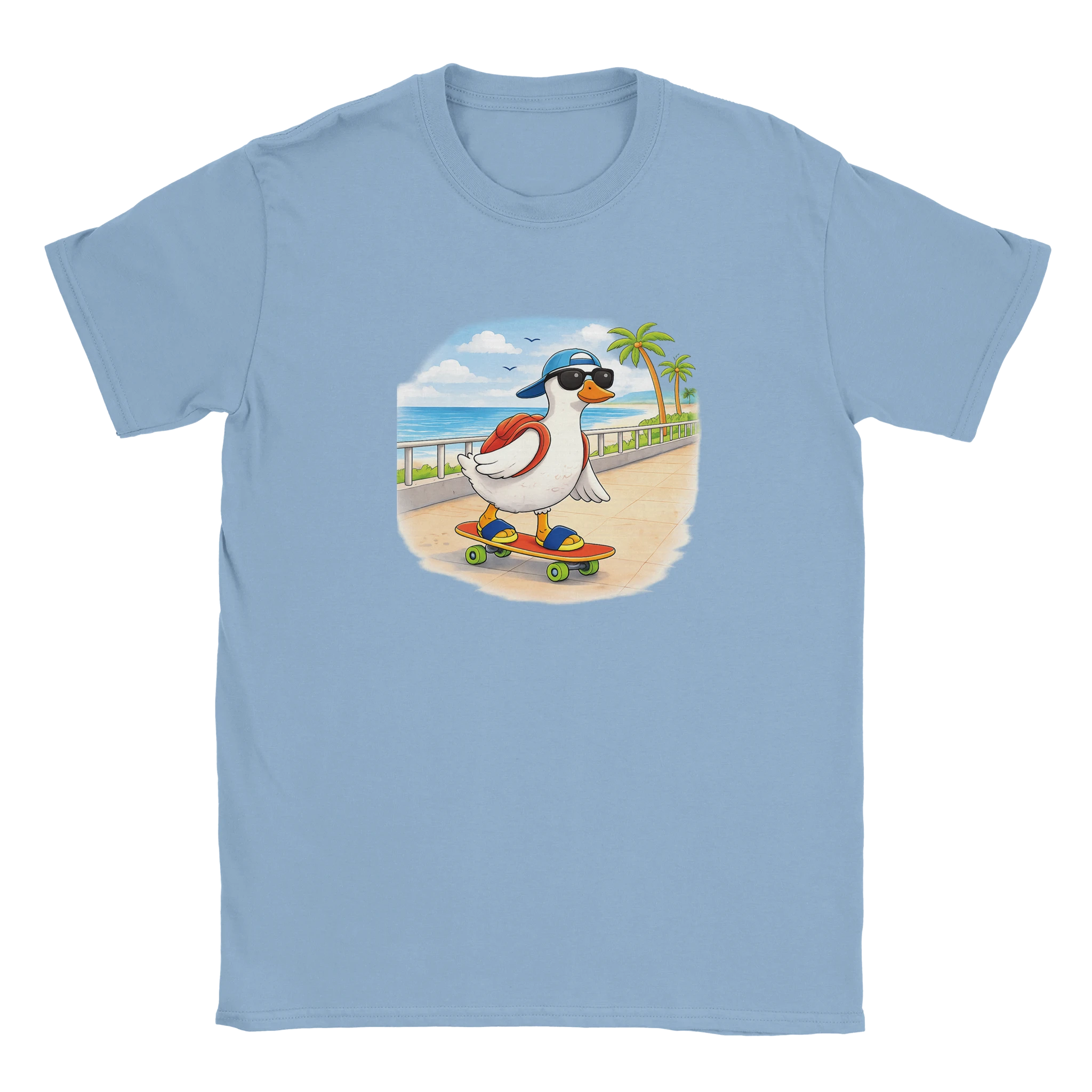 Blue graphic t-shirt with cartoon duck skateboard design, paired with striped pants in a beach setting