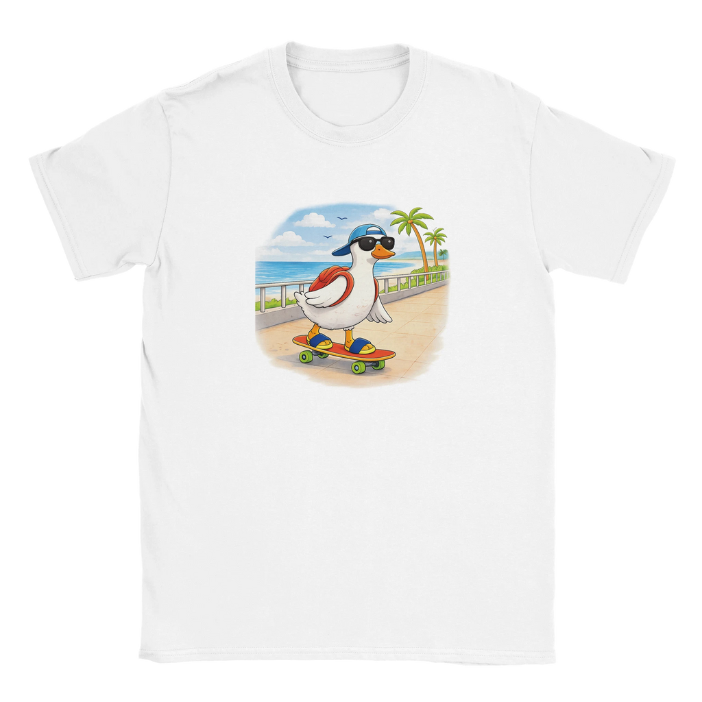 White graphic t-shirt with cartoon duck skateboarding design, worn with striped pants on a sunny beach