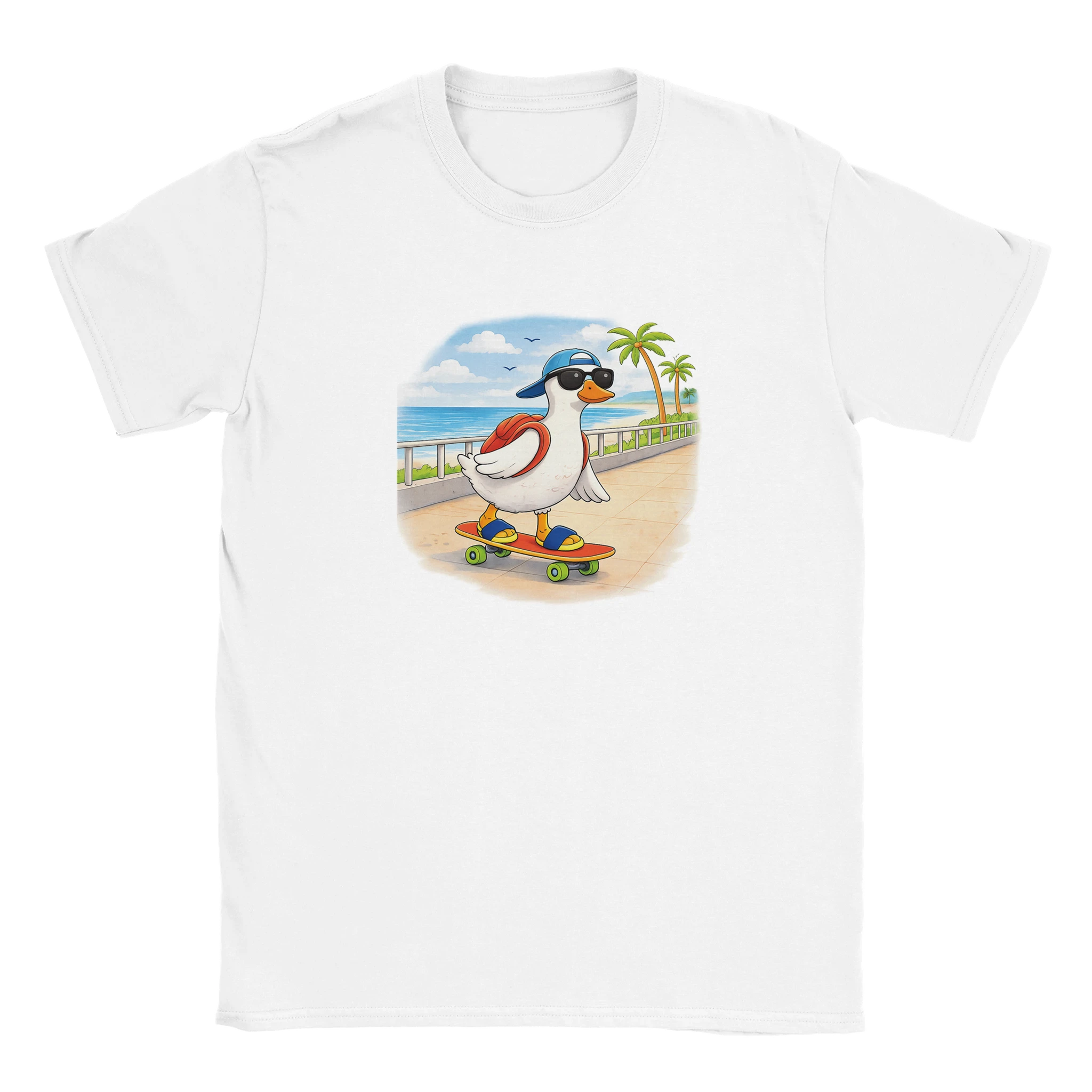 White graphic t-shirt with cartoon duck skateboarding design, worn with striped pants on a sunny beach